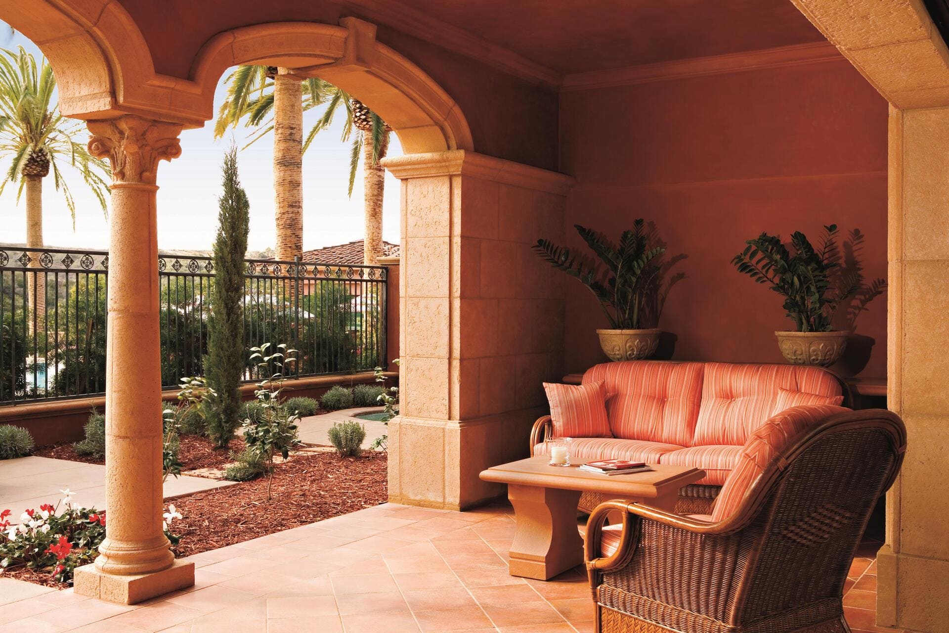 villa balcony with pink love seat
