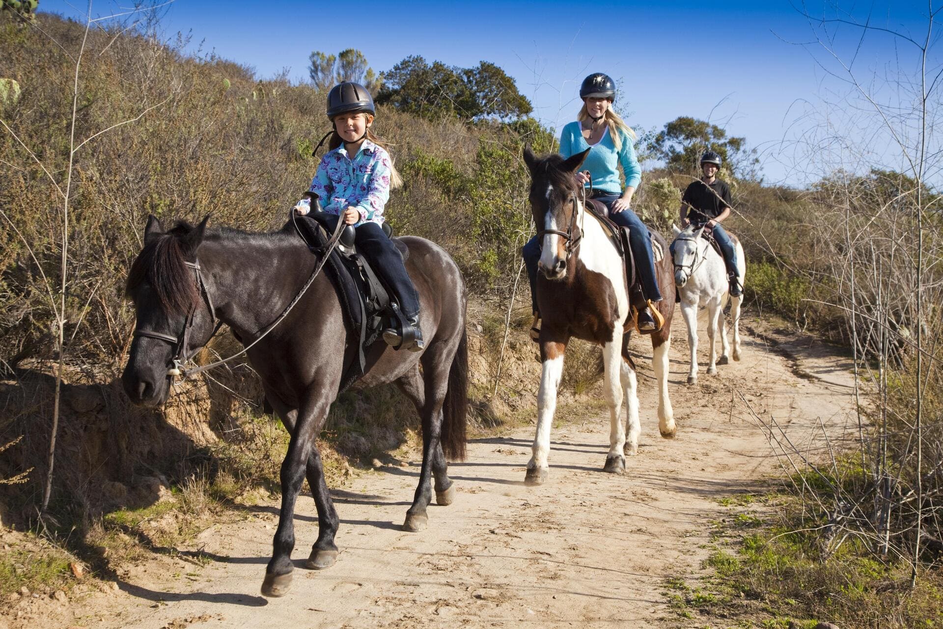 Family on a trail ride