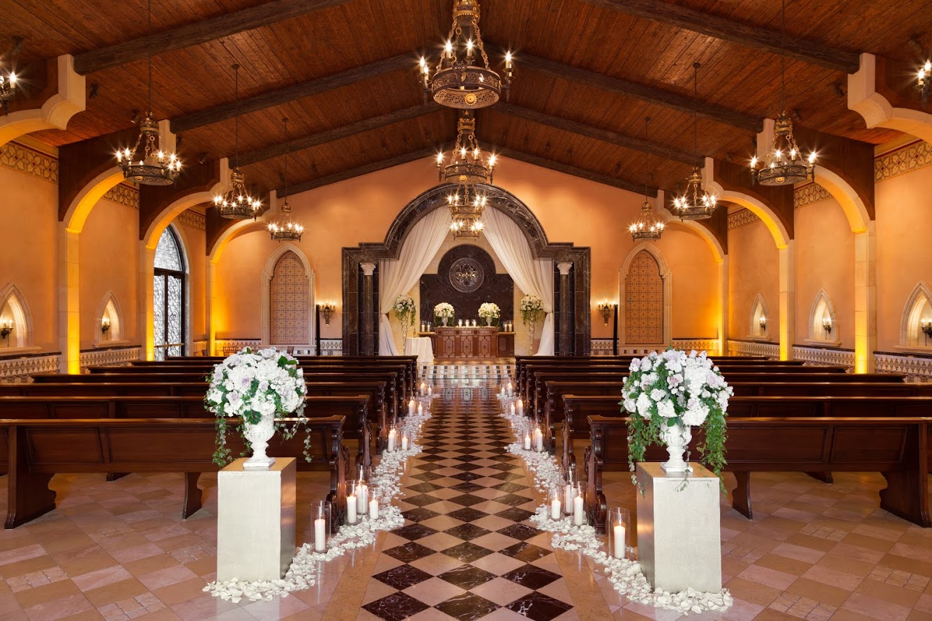 Large room with high ceilings set up for a wedding