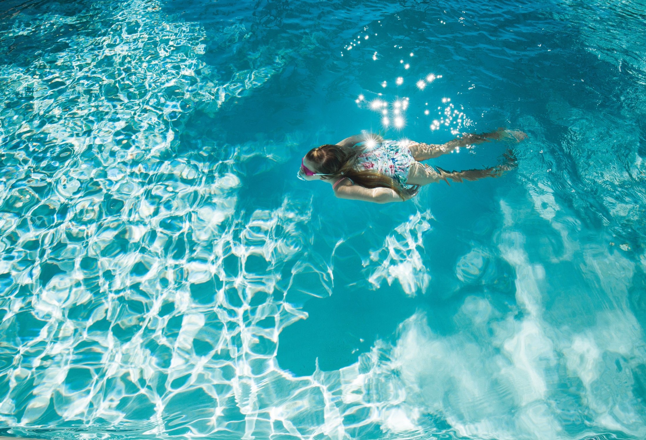 girl swimming in pool